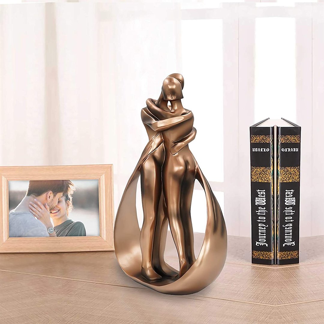 Romantic abstract passion hug kiss affectionate couple statue