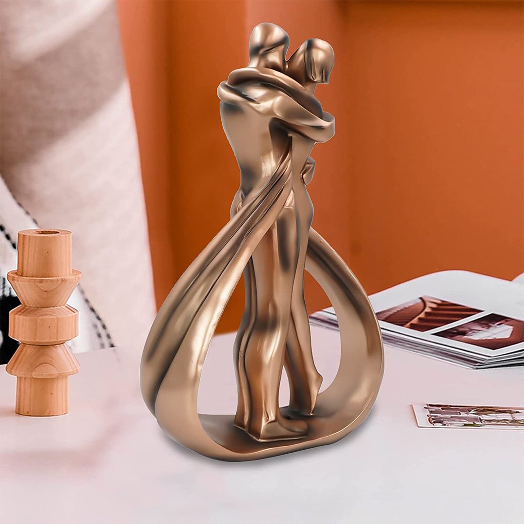 Romantic abstract passion hug kiss affectionate couple statue